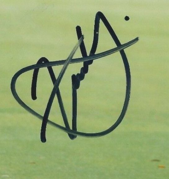 Firma de Xander Schauffele