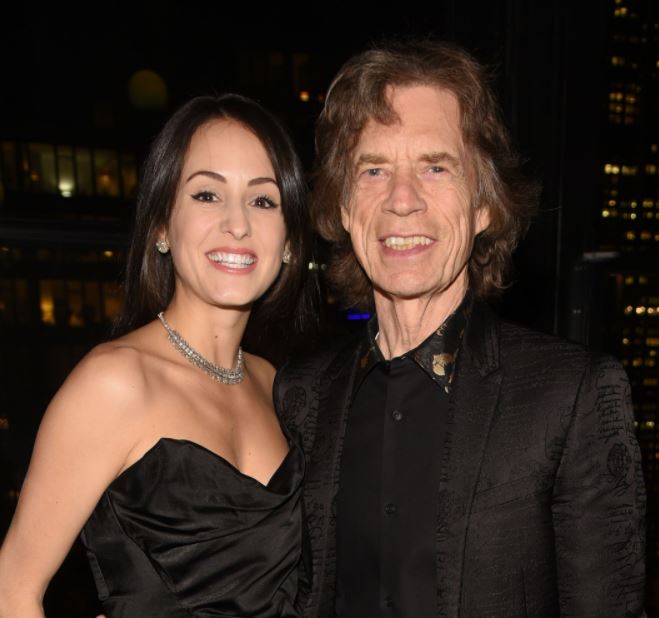 Mick Jagger con su novia Melanie Hamrick